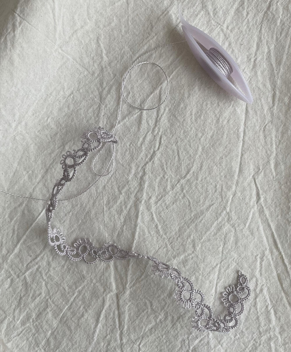 Choker in DMC perle cotton #3743. Clover shuttle.