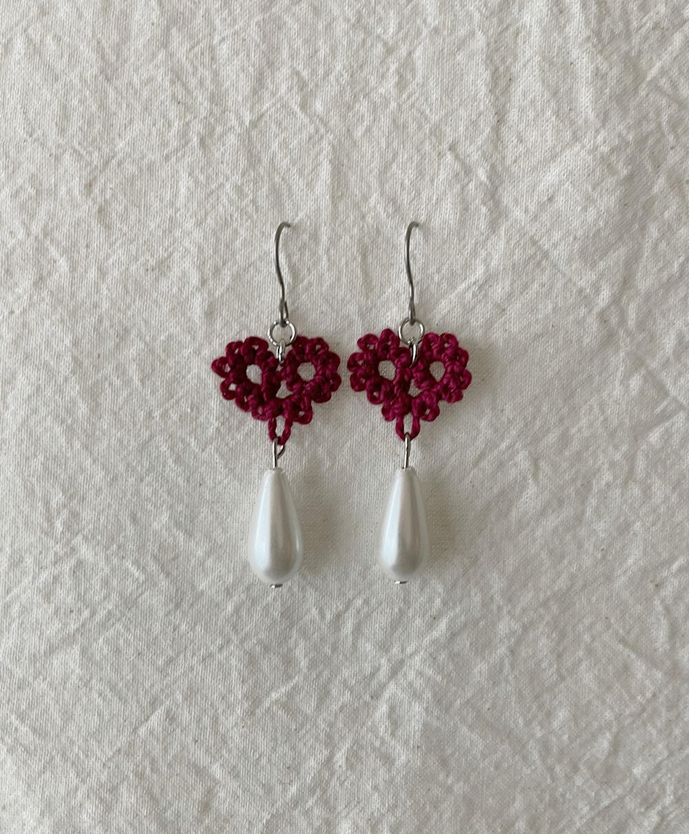 Dark garnet hearts earrings.