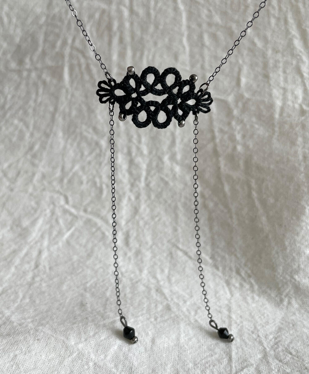 Bolo-inspired tatting lace necklace.