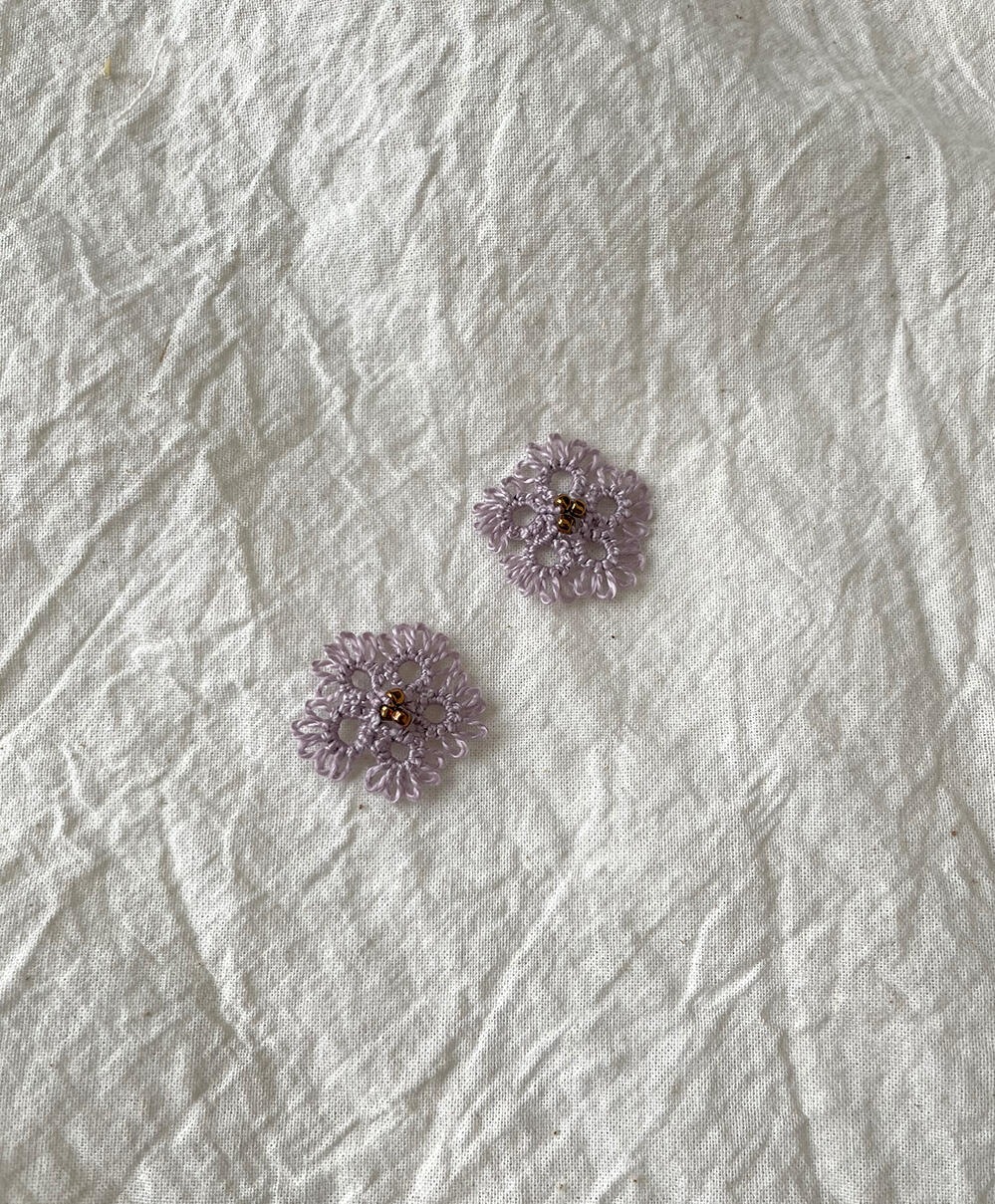 Tatting lace flowers.