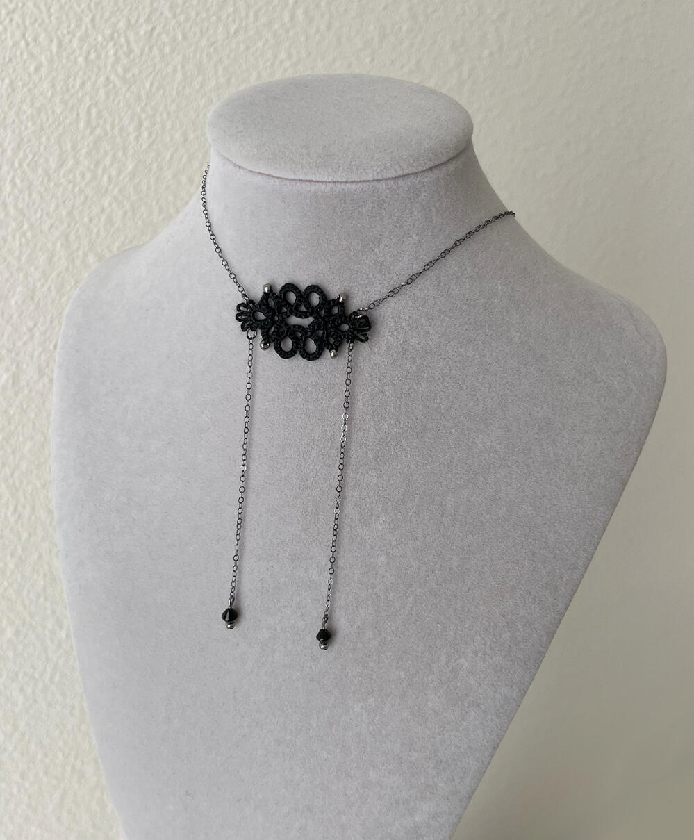 Bolo-inspired tatting lace necklace.